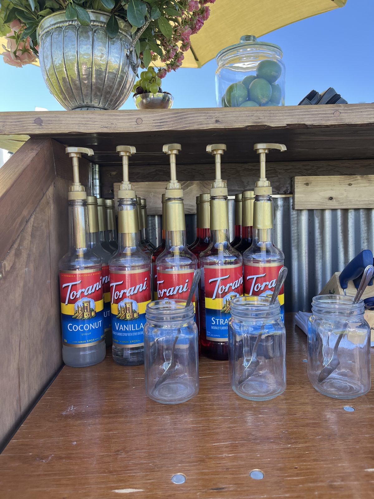Close-up of Torani syrup bottles on the bar