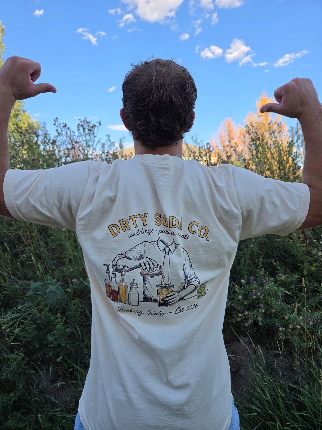 Parker wearing the DRTY Soda Co. t-shirt, back design