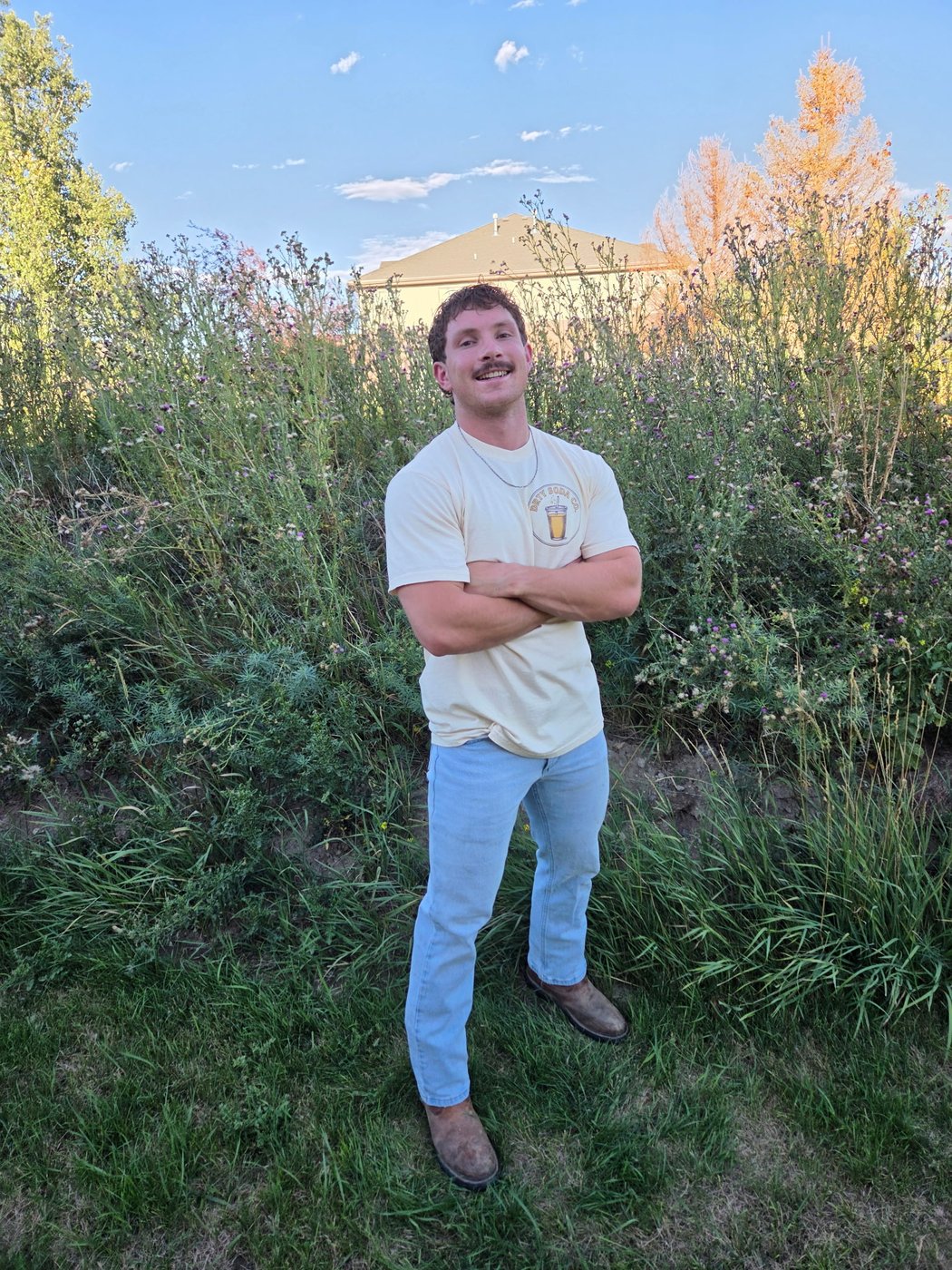 Parker wearing the DRTY Soda Co. t-shirt, front logo